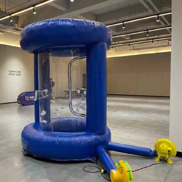 Blue inflatable catch and win dome with clear walls