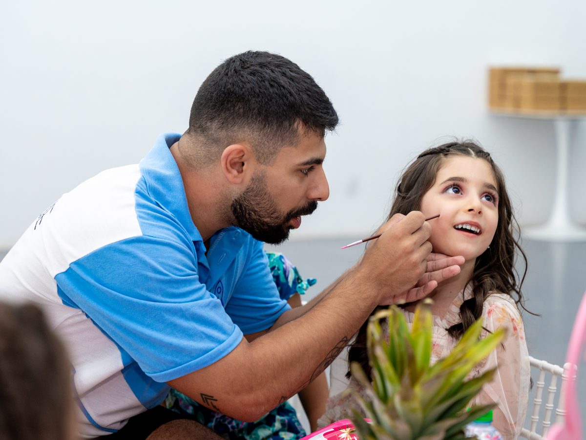 Face and Hand Painting Booth at a La Folie kids birthday party in Dubai